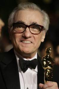 Martin Scorsese with the Best Director Oscar he won for The Departed
