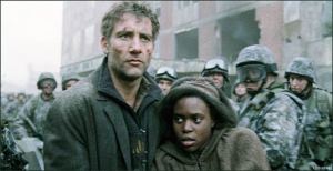 Theo (Clive Owen) leads Kee (Clare-Hope Ashitey) to safety in Children Of Men