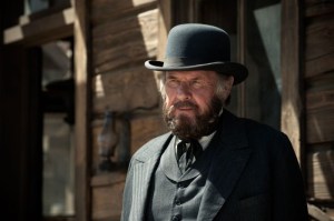 Railroad tycoon Latham Cole (Tom Wilkinson) in The Lone Ranger
