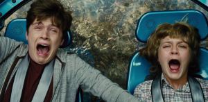 Brothers Zach (Nick Robinson) and Gray Mitchell (Ty Simpkins) look suitably scared in Jurassic World