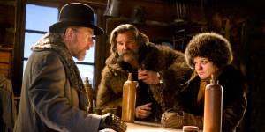 "The Little Man" (Tim Roth) questions "The Hangman" (Kurt Russell) and "The Prisoner" (Jennifer Jason Leigh) in The Hateful Eight